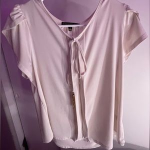 White/cream top with ruffled white sleeves